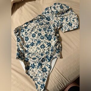 Large free people one shoulder thong bodysuit.